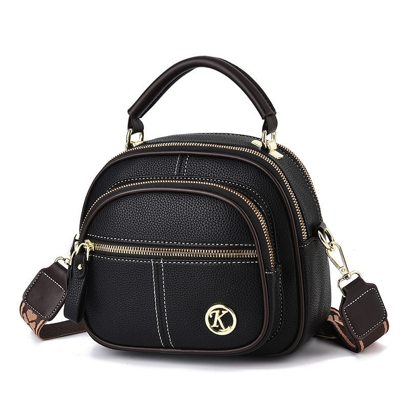 Katy™ Verstellbare Ledertasche mit breitem Schultergurt